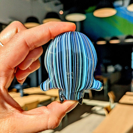 AKM x Akio Skull, 2018 Borosilicate Glass Pendant with Opal Eyes Approx. 2.4 x 2.4 in Hand blown glass made by AKM and Akio. Signed "AKM" + Dated "2018"