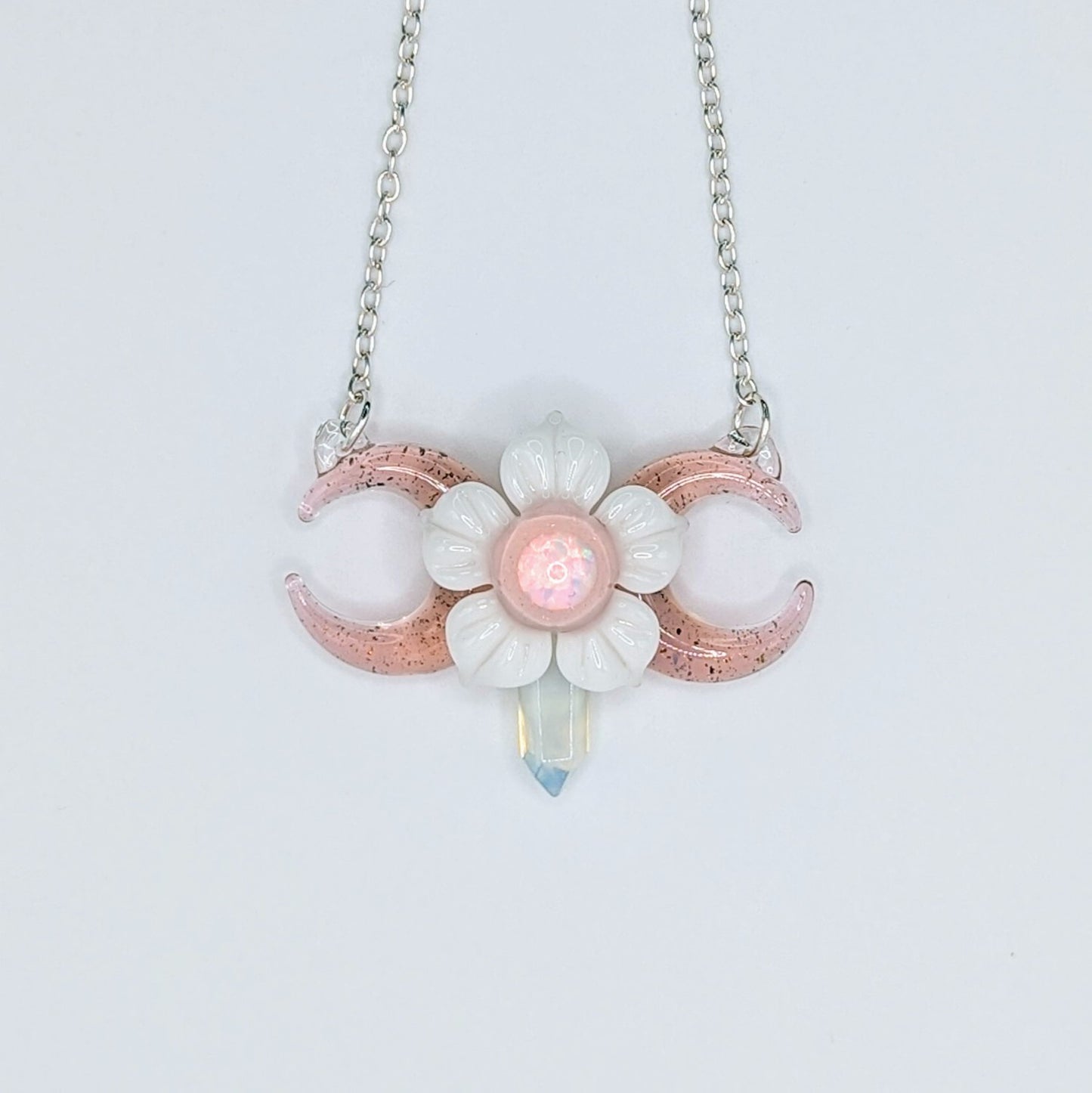 Mars Pink Triple Moon With Flower & Crystal Point, 2024 Borosilicate Glass Pendant Approx. 48 mm x 35.5 mm Hand blown & cold worked borosilicate glass pendant made by Mars.