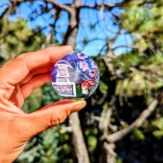 Piper Dan Asanoha Castle Scene, 2023 UV Reactive Borosilicate Glass Marble 43.5 mm Hand blown glass made by Piper Dan (Daniel Benway). Signed "DB" + Dated "2023"