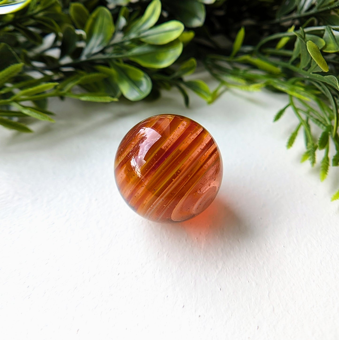 Alex Ubatuba
Borosilicate Glass Marble
31 mm
Hand blown borosilicate glass marble made by Alex Ubatuba.