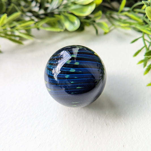 Alex Ubatuba
Borosilicate Glass Marble
33 mm
Hand blown borosilicate glass marble made by Alex Ubatuba.