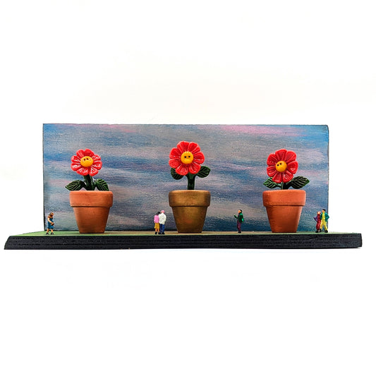 Ethan Windy
Land of the Giants, 2024
Glass Sculpture
Potted flower (each): 41 mm diameter | 86 mm tall
Hand painted wood base: 12 x 5 in
Signed + Dated by the artist. Ethan Windy's Giant Flowers Series