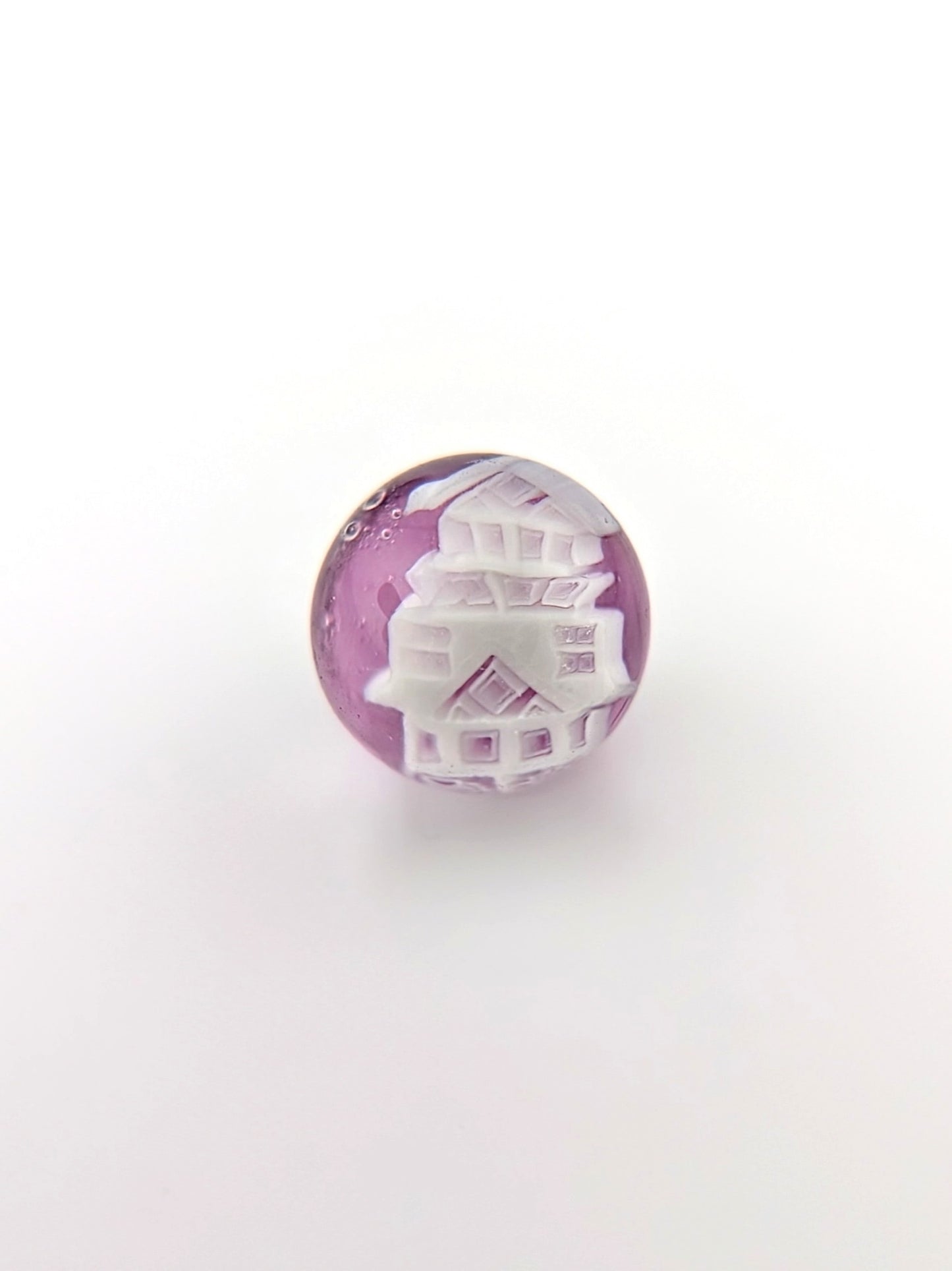 Piper Dan
Asanoha Castle Scene, 2021
UV Reactive Borosilicate Glass Marble Set
21 mm
Hand blown glass made by Piper Dan (Daniel Benway). Set includes 24.8 mm marble (mib), 2 pearls, 1 pillar & 1 valve. Signed "DB" + Dated "2021"