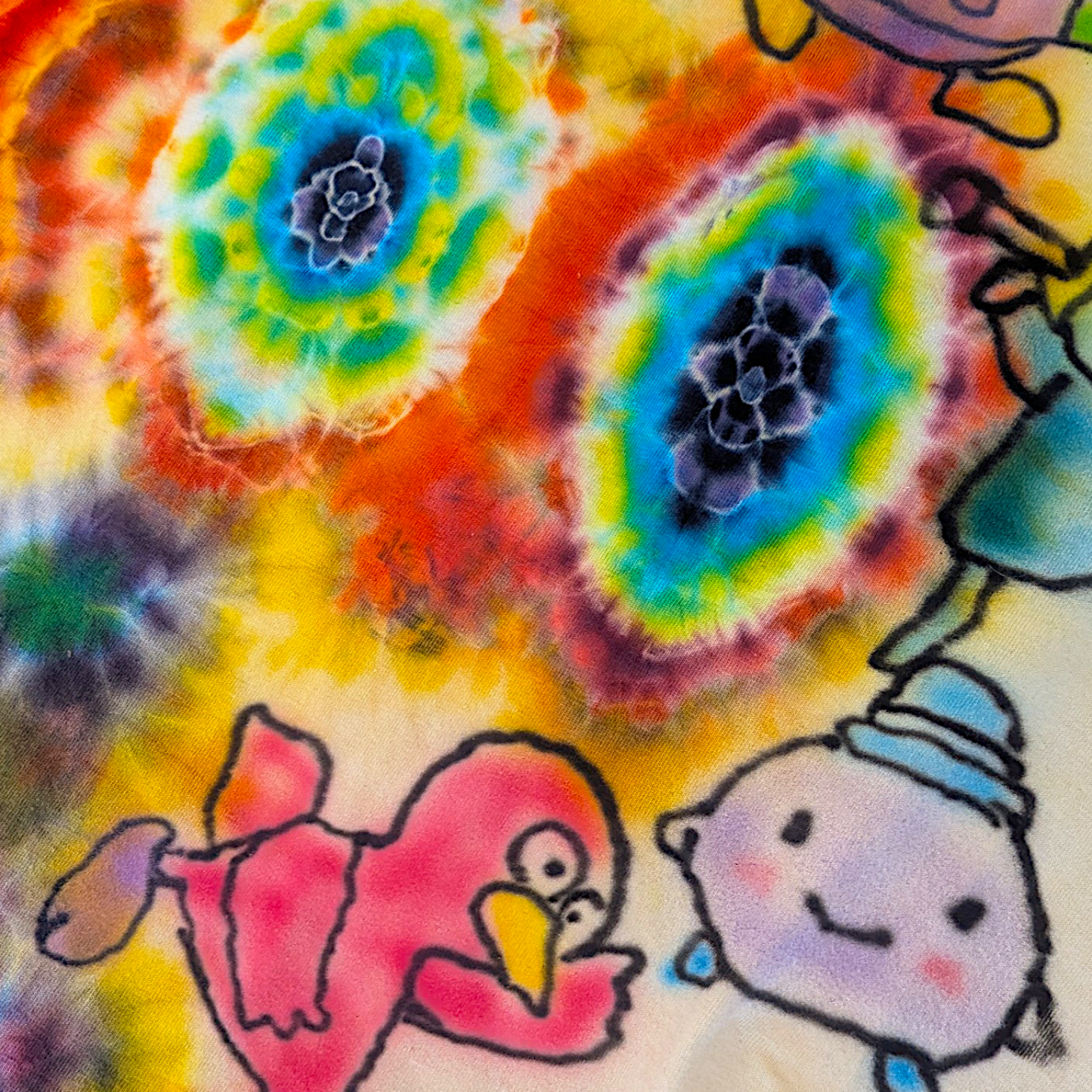 Trevy Metal x Yogu
Rainbow Friends, 2026
Hand dyed + hand painted cotton shirt
Sizing:
- Chest (pit-to-pit): 24 in
- Length (highest shoulder point to hem): 34.5 in
- Sleeve length: 10 in
*Please note this piece is featured in Trevy Metal’s solo show that will be on display until May 23rd, 2026. Artwork from the exhibition will be shipped early the following week. Thank you for your support & understanding :)