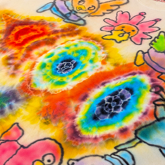 Trevy Metal x Yogu
Rainbow Friends, 2026
Hand dyed + hand painted cotton shirt
Sizing:
- Chest (pit-to-pit): 24 in
- Length (highest shoulder point to hem): 34.5 in
- Sleeve length: 10 in
*Please note this piece is featured in Trevy Metal’s solo show that will be on display until May 23rd, 2026. Artwork from the exhibition will be shipped early the following week. Thank you for your support & understanding :)