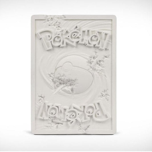 Daniel Arsham x Pokemon Crystalized Mew Card, 2022 12 x 8.6 x 1 in / 5 lbs Edition of 500 WHITE CRYSTALIZED MEW CARD is a sculpture modeled after the 1st edition Mew Card in the Pokémon Trading Card Game. It has been reimagined as a monument of Kanto uncovered through the passage of time. This edition, made of white cast resin and crystal dust, is a scaled down version of larger work made in Arsham Studio.