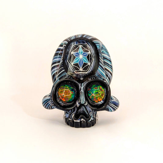 AKM x Akio Skull, 2018 Borosilicate Glass Pendant with Opal Eyes Approx. 2.4 x 2.4 in  Hand blown glass made by AKM and Akio. Signed "AKM" + Dated "2018"