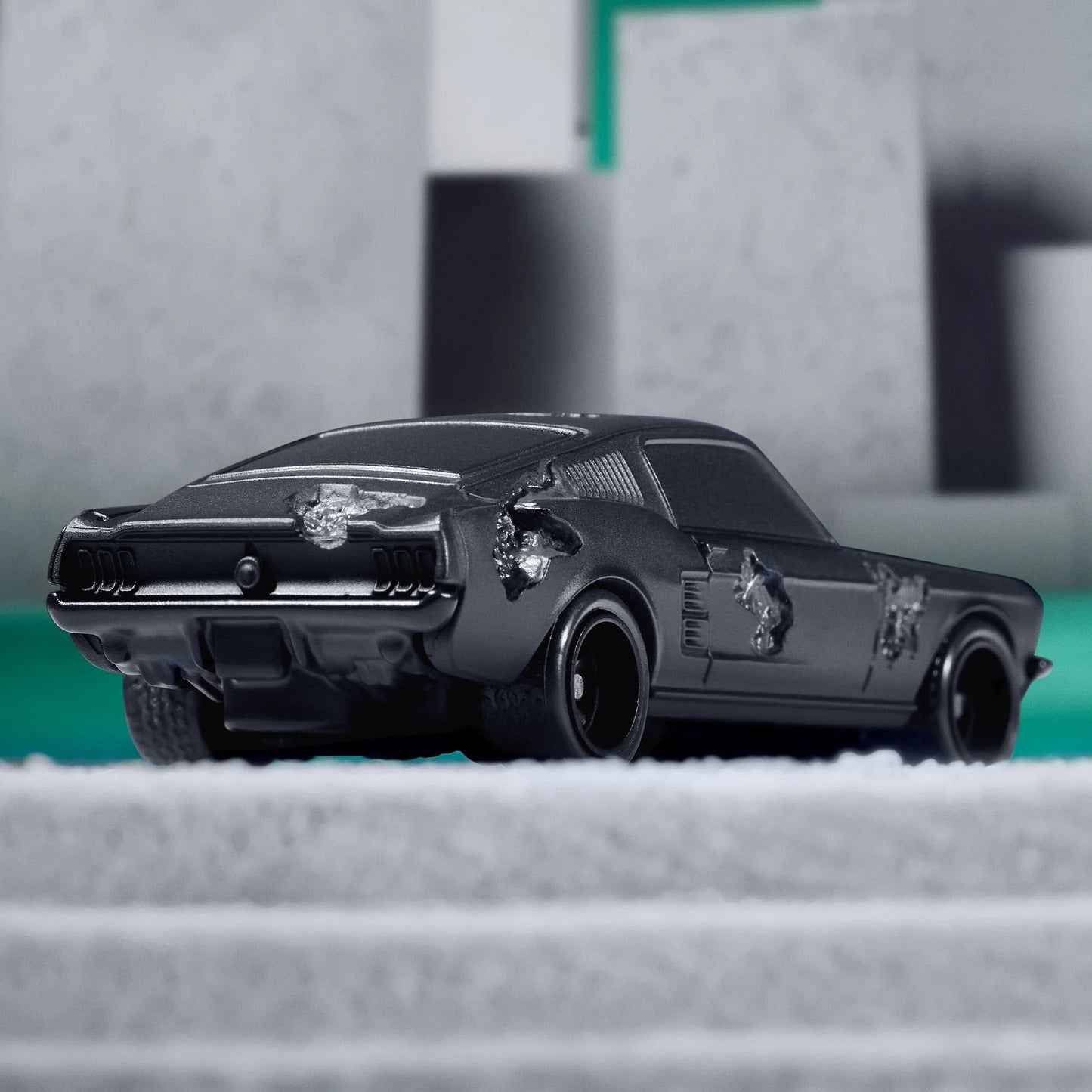 Daniel Arsham x Hot Wheels Ford Mustang, 2024  Features: Crystallized erosions Body Color: Arsham Black Body Type: Silkstone Chassis: ZAMAC Wheels: Real Riders 5-spoke mag wheels  Scale 1:64 Includes sealing label and Certificate of Authenticity Packaged in a collector display case 