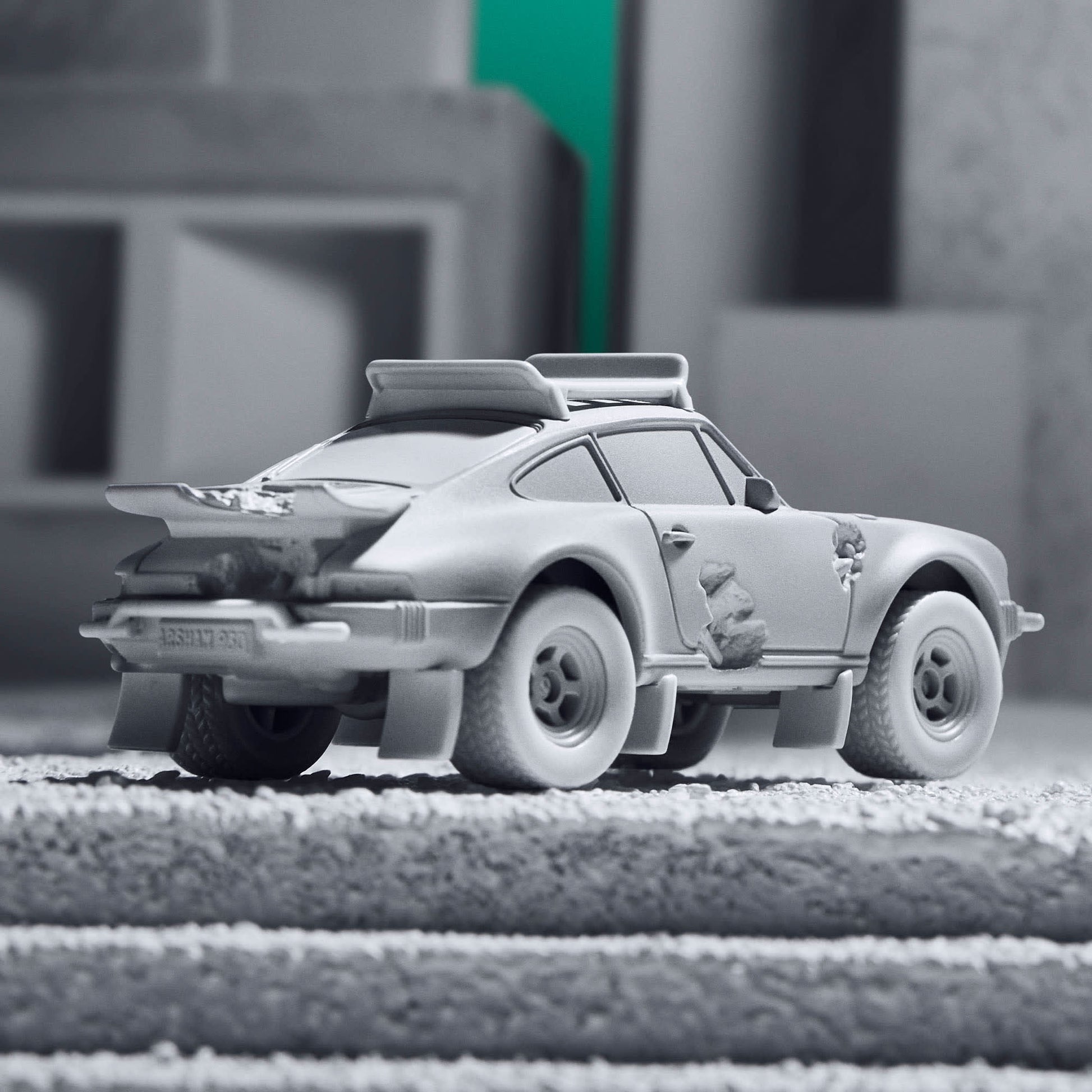 Features: Crystallized erosions Body Color: Arsham Grey Body Type: Silkstone Chassis: ZAMAC Wheels: Real Riders 5-spoke mag wheels  Scale 1:64 Includes sealing label and Certificate of Authenticity Packaged in a collector display case 