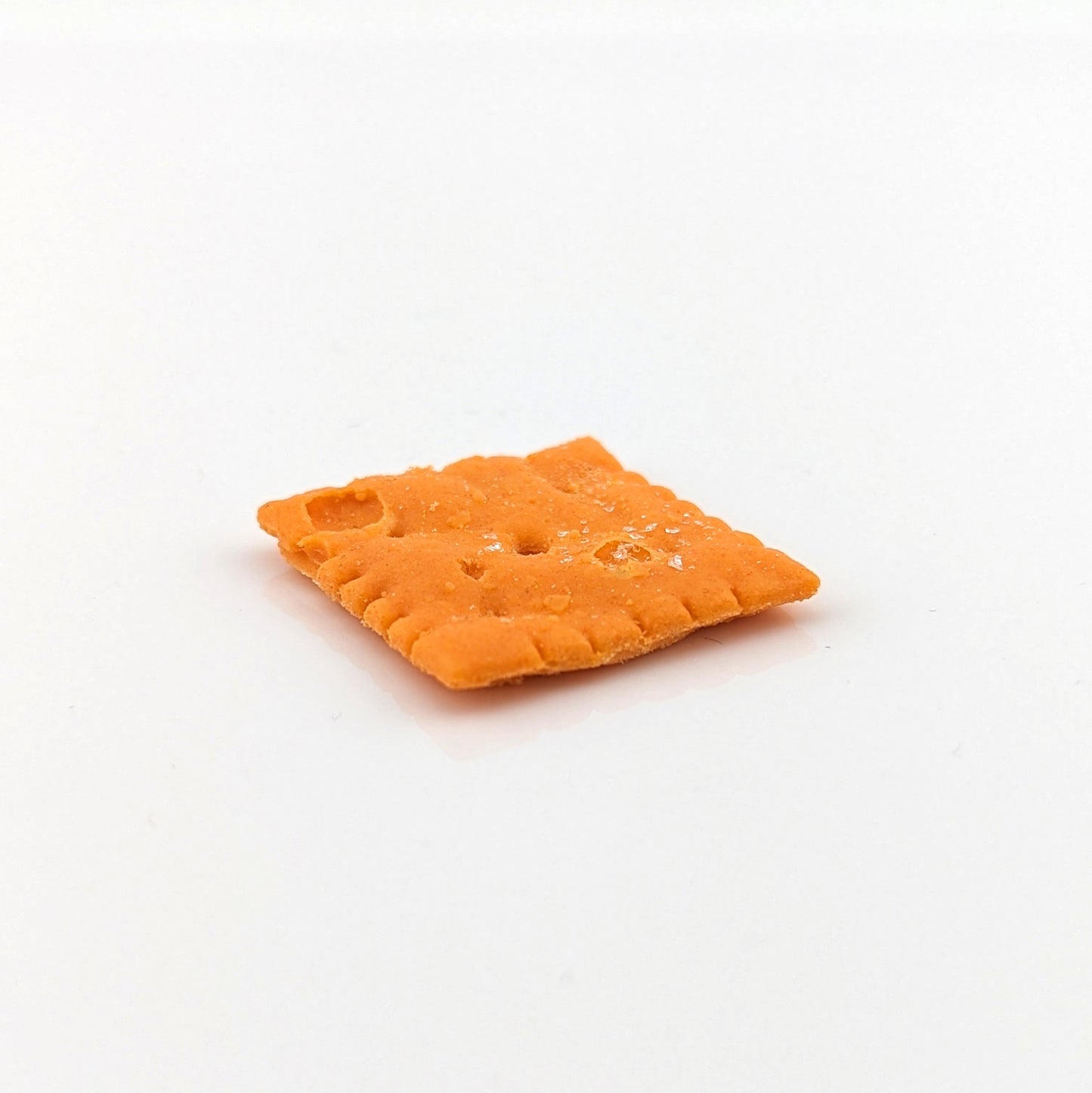 Eriko Kobayashi Cheez-It, 2024 Glass Sculpture Approx. 27 x 29 x 4 mm  From Eriko Kobayashi's Hyper-Realistic Glass Food Series