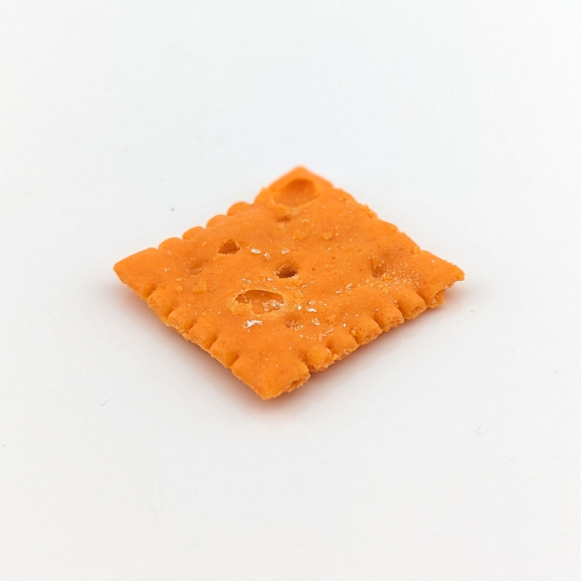 Eriko Kobayashi Cheez-It, 2024 Glass Sculpture Approx. 27 x 29 x 4 mm  From Eriko Kobayashi's Hyper-Realistic Glass Food Series