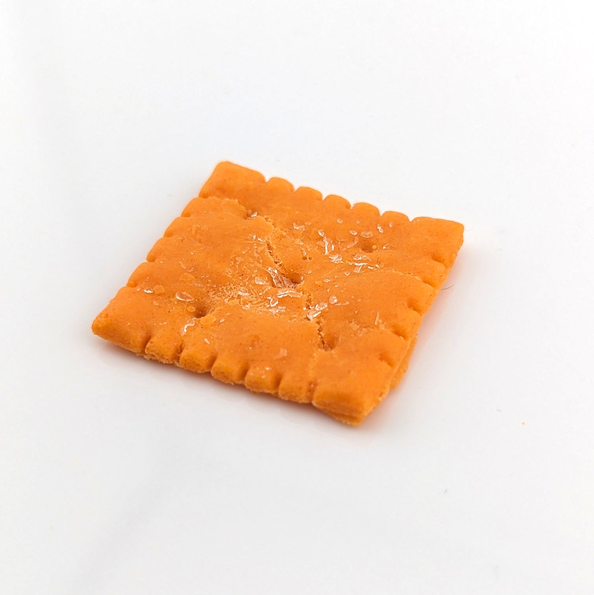 Eriko Kobayashi Cheez-It, 2024 Glass Sculpture Approx. 28 x 30 x 4 mm  From Eriko Kobayashi's Hyper-Realistic Glass Food Series