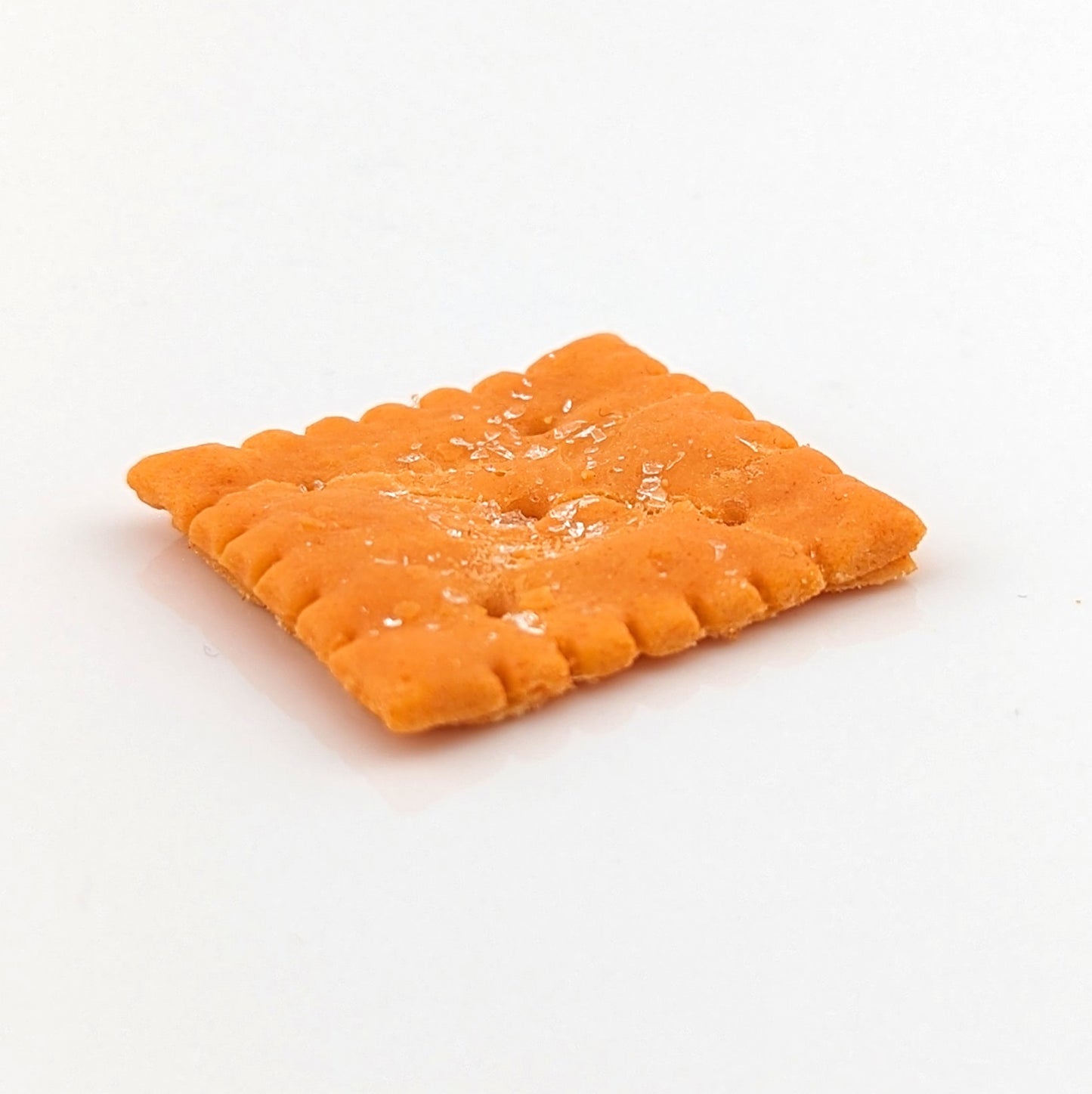 Eriko Kobayashi Cheez-It, 2024 Glass Sculpture Approx. 28 x 30 x 4 mm  From Eriko Kobayashi's Hyper-Realistic Glass Food Series