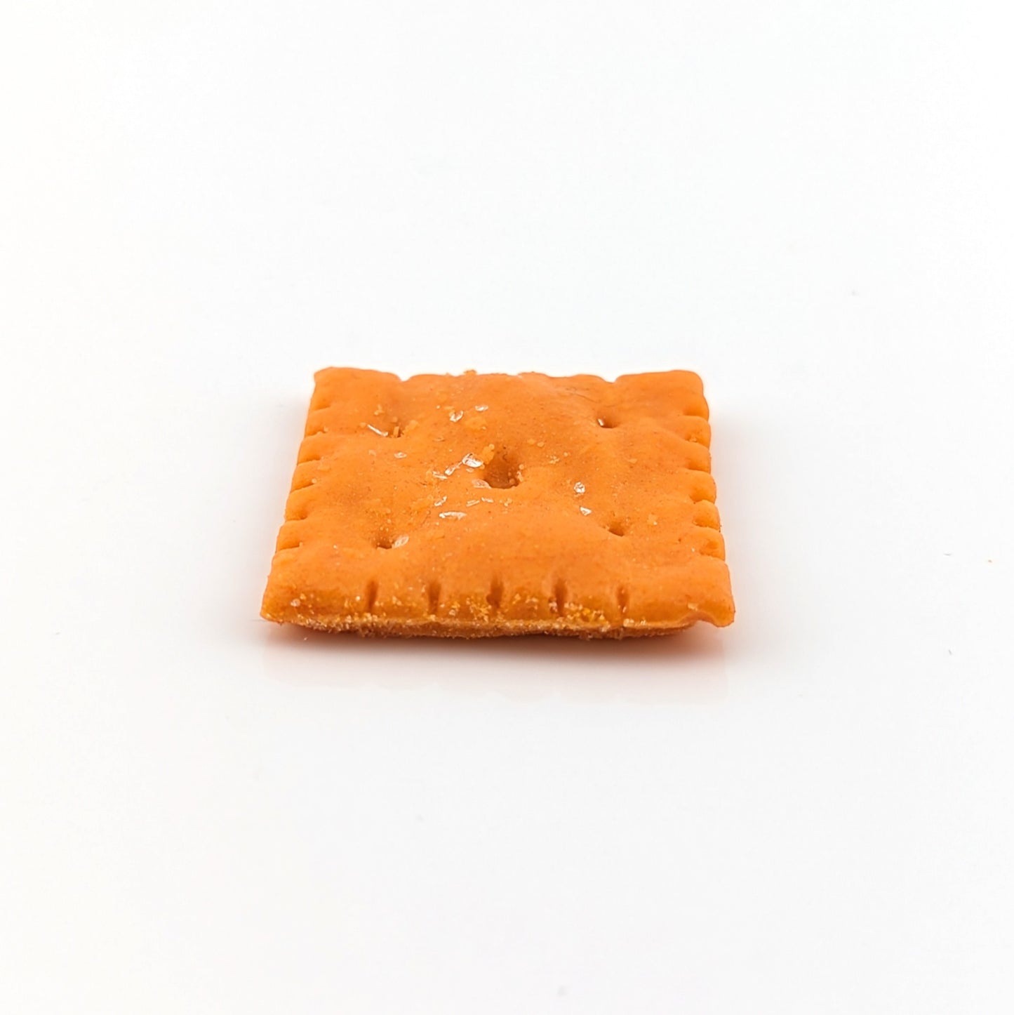 Eriko Kobayashi Cheez-It, 2024 Glass Sculpture Approx. 28 x 30 x 4 mm  From Eriko Kobayashi's Hyper-Realistic Glass Food Series