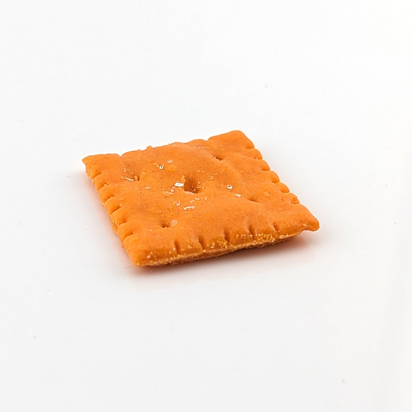 Eriko Kobayashi Cheez-It, 2024 Glass Sculpture Approx. 28 x 30 x 4 mm  From Eriko Kobayashi's Hyper-Realistic Glass Food Series