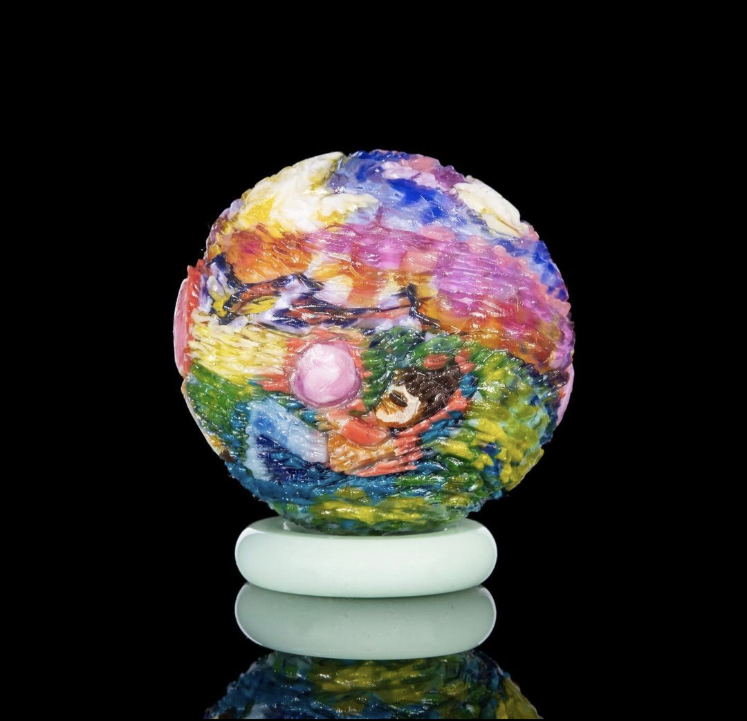 Hallie Krebs Never Miss A Sunday Show, 2023 Borosilicate Glass Marble Approx. 40 mm  Hand blown & carved borosilicate glass marble made by Hallie Krebs.