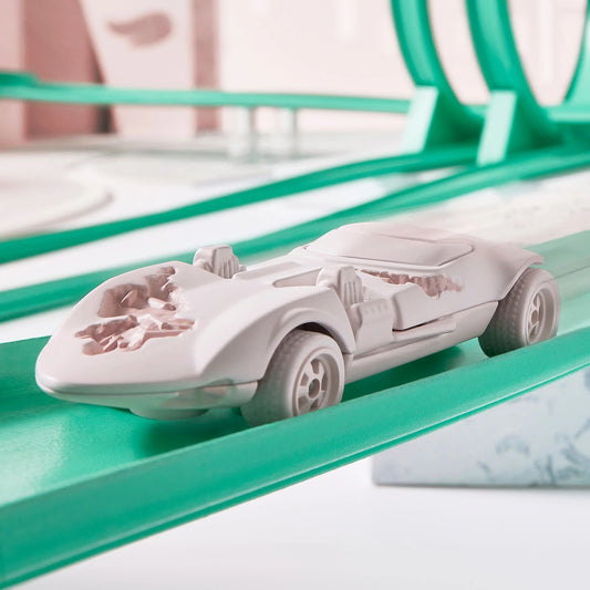 Daniel Arsham x Hot Wheels  Eroded Twin Mill, 2024 Features: Crystallized erosions Body Color: Arsham Pink Body Type: Silkstone Chassis: ZAMAC Wheels: Arsham pink Real Riders 5-spoke classic wheels Scale 1:64 Includes sealing label and Certificate of Authenticity Packaged in a collector display case with simulated concrete base.