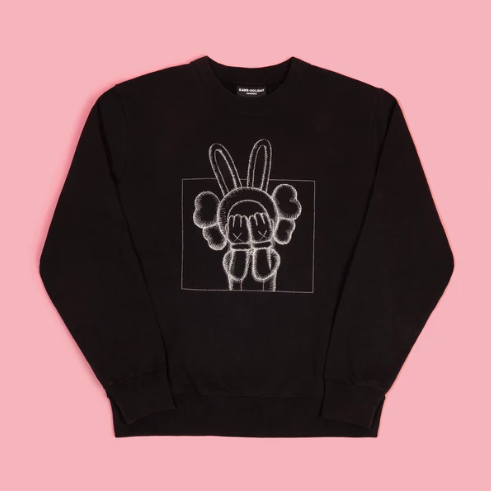KAWS "HOLIDAY INDONESIA" Sweater - Black  Size: Medium - Chest 23 in ; Length 27 in (measurements are approximate) 100% Cotton This sweater / crewneck sweatshirt was created to celebrate the opening of the 2023 "KAWS:HOLIDAY (INDONESIA)" installation at Prambanan Temple Park Complex located on the border between the two provinces of Yogyakarta and Central Java on Java Island in Indonesia.