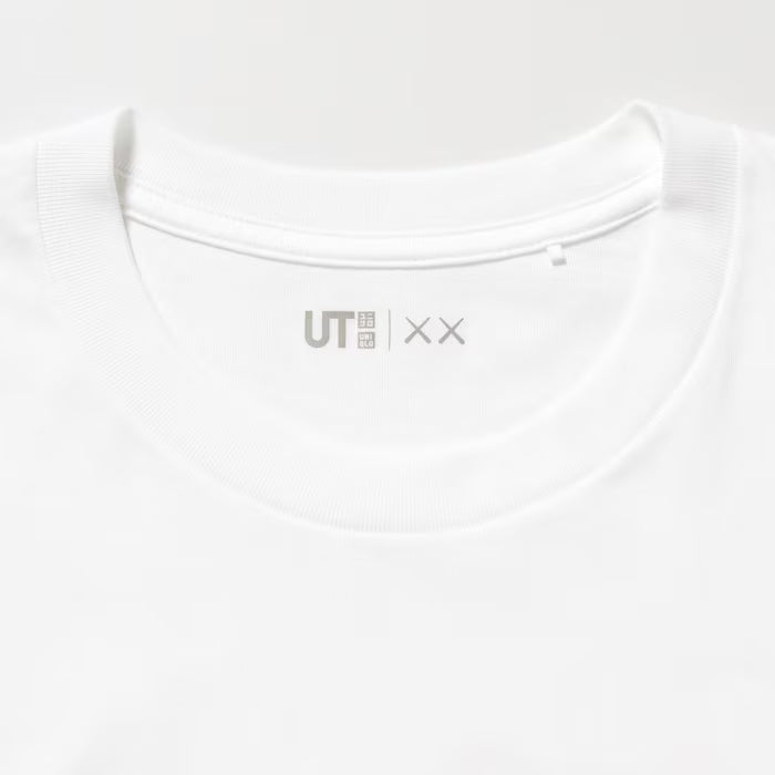 KAWS x UNIQLO Short Sleeve Tee Shirt - Pink Body: 100% Cotton Rib: 78% Cotton 22% Polyester Unisex Crew neck and long sleeve
