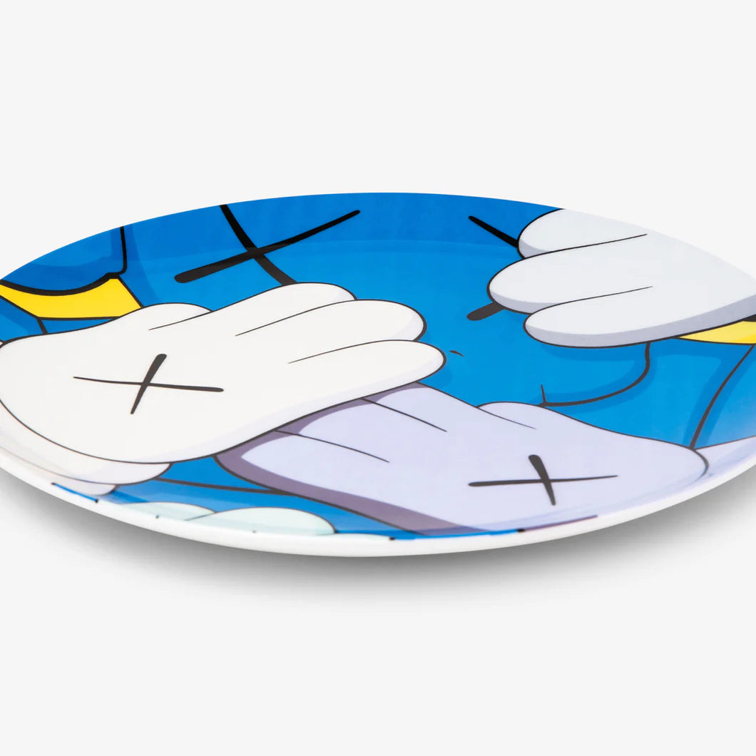 KAWS x Artist Plate Project URGE, 2020 Fine Bone China Plate 11.5 x 11.5 in Edition of 250  Printed signature and edition details on verso. Accompanied by custom artist box with printed signature. Dishwasher and microwave safe. Produced by Prospect.
