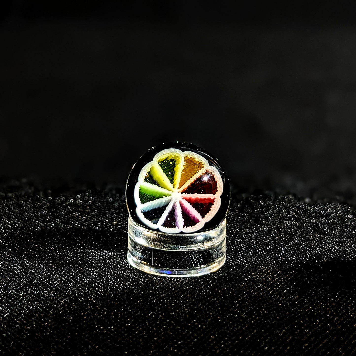 Sam Lyons Rainbow Slice, 2023 UV Reactive Borosilicate Glass Marble