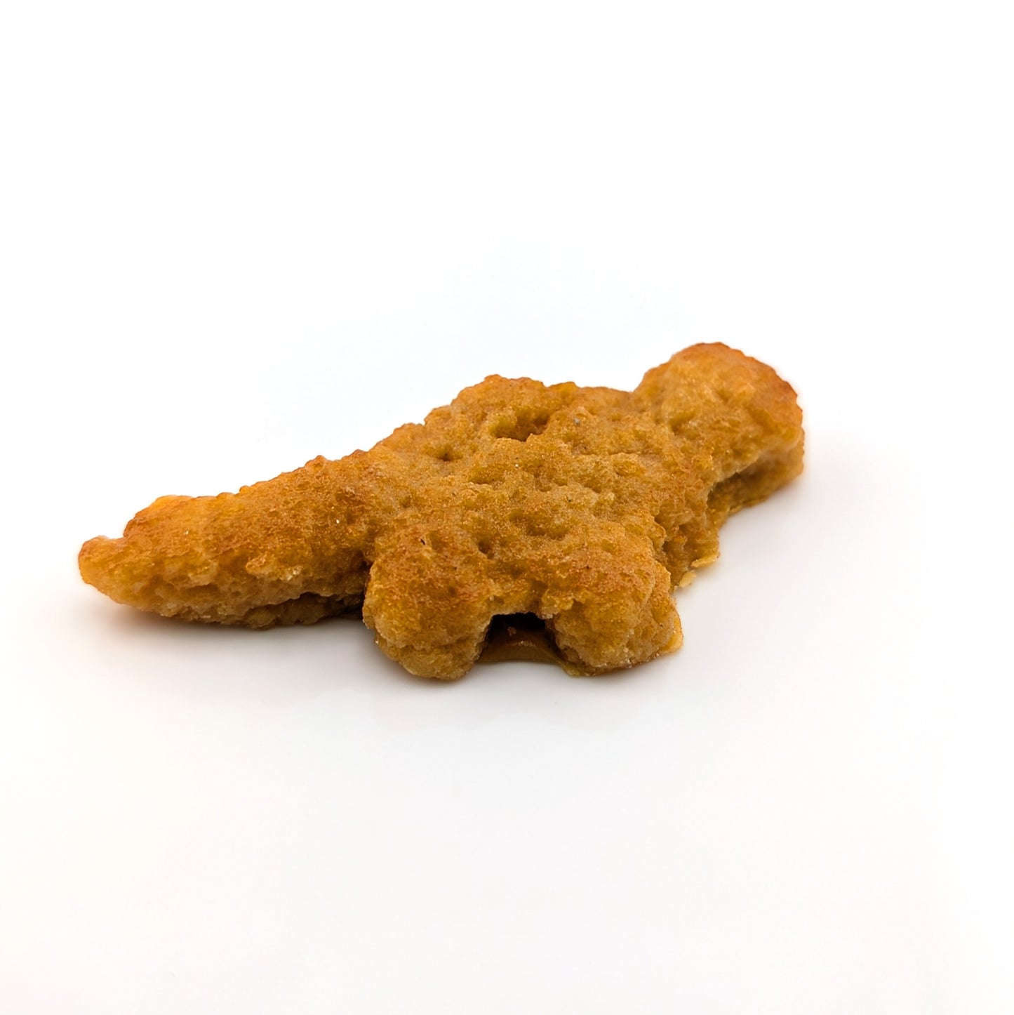 Eriko Kobayashi
Dino Nugget, 2024
Glass Sculpture
Approx 66.5 x 30.5 x 11 mm

From Eriko Kobayashi's Hyper-Realistic Glass Food Series