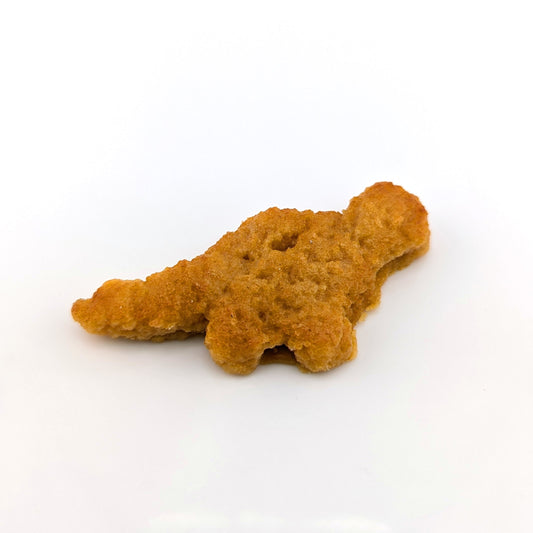 Eriko Kobayashi
Dino Nugget, 2024
Glass Sculpture
Approx 66.5 x 30.5 x 11 mm

From Eriko Kobayashi's Hyper-Realistic Glass Food Series