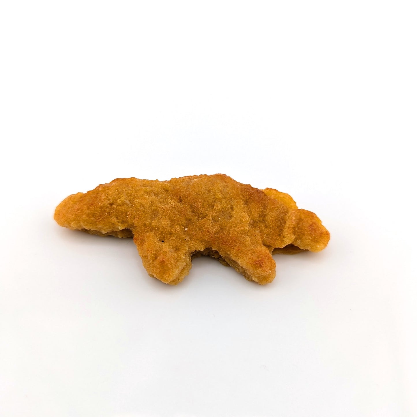 Eriko Kobayashi
Dino Nugget, 2024
Glass Sculpture
Approx 68.5 x 30 x 11 mm

From Eriko Kobayashi's Hyper-Realistic Glass Food Series