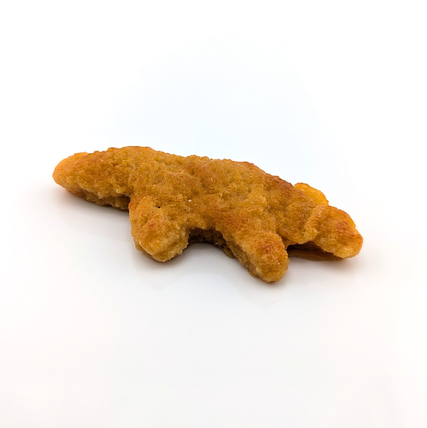 Eriko Kobayashi
Dino Nugget, 2024
Glass Sculpture
Approx 68.5 x 30 x 11 mm

From Eriko Kobayashi's Hyper-Realistic Glass Food Series