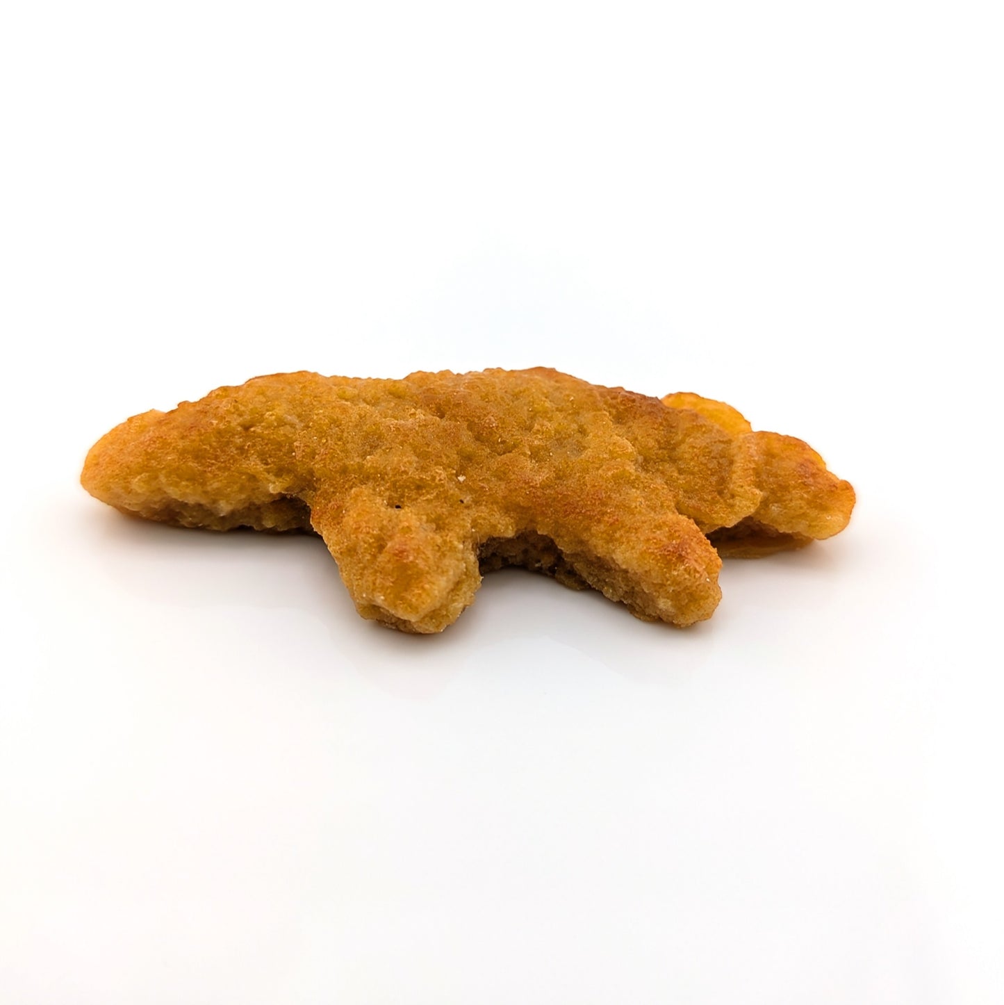 Eriko Kobayashi
Dino Nugget, 2024
Glass Sculpture
Approx 68.5 x 30 x 11 mm

From Eriko Kobayashi's Hyper-Realistic Glass Food Series