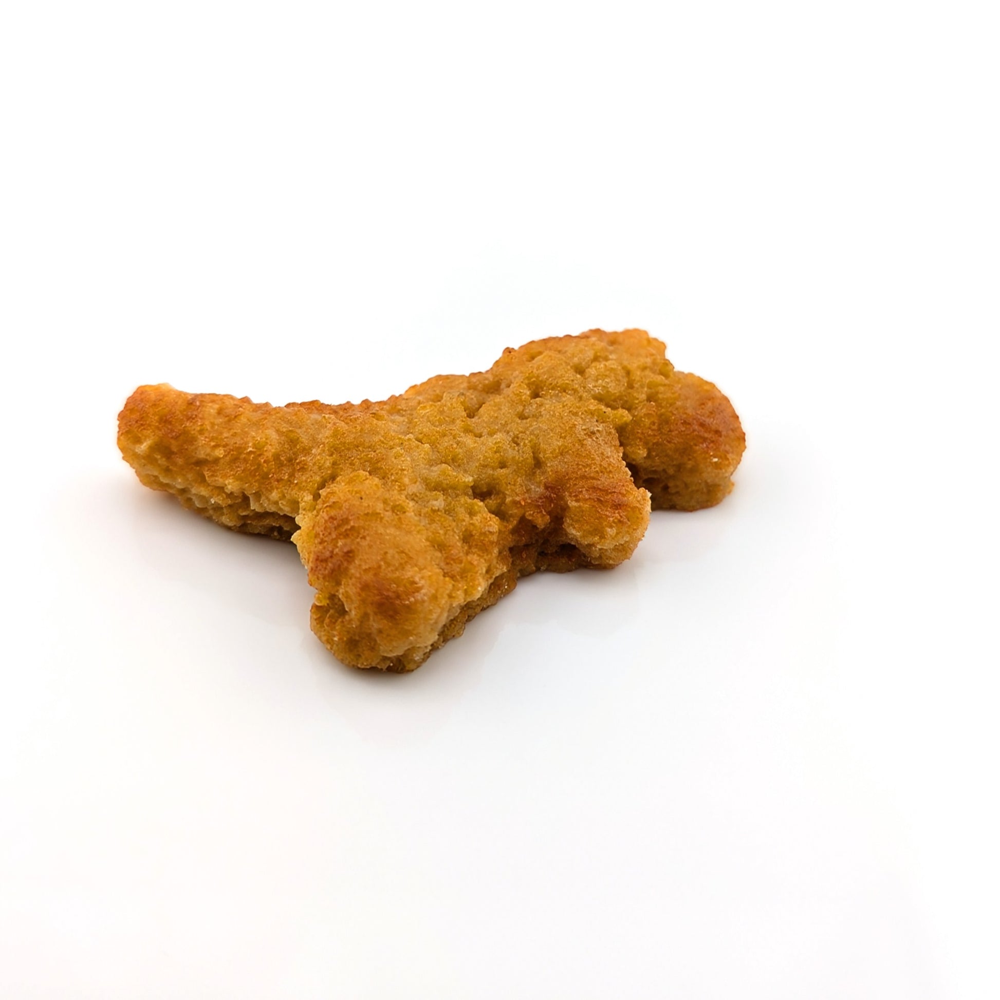 Eriko Kobayashi
Dino Nugget, 2024
Glass Sculpture
Approx 52 x 48 x 11 mm

From Eriko Kobayashi's Hyper-Realistic Glass Food Series