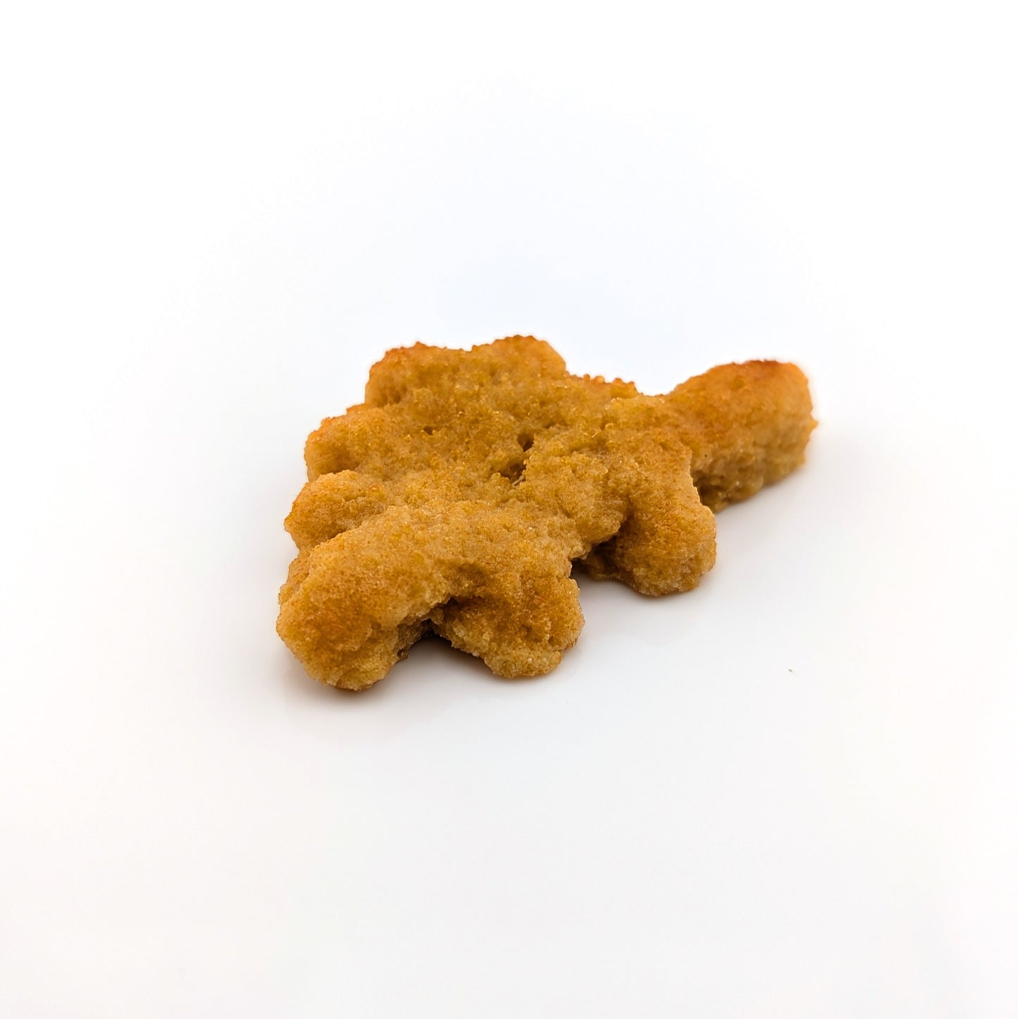 Eriko Kobayashi
Dino Nugget, 2024
Glass Sculpture
Approx 58 x 38 x 10 mm

From Eriko Kobayashi's Hyper-Realistic Glass Food Series