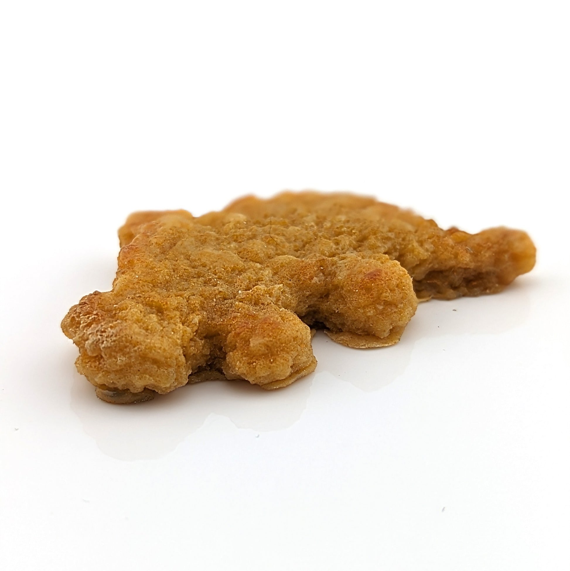 Eriko Kobayashi Dino Nugget, 2024 Glass Sculpture Approx 59 x 37 x 10 mm  From Eriko Kobayashi's Hyper-Realistic Glass Food Series