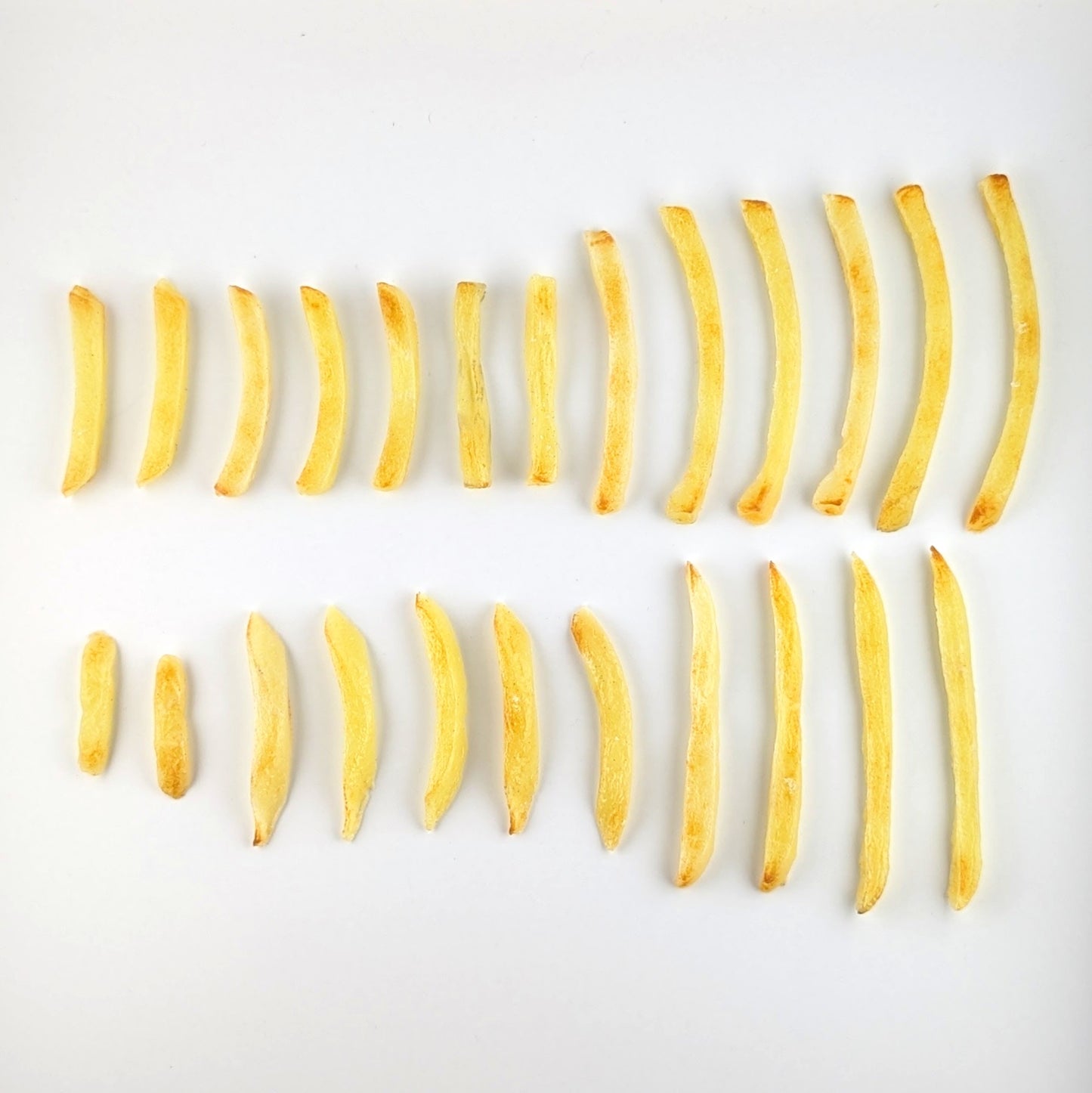 Eriko Kobayashi
Side of Fries, 2024
Glass Sculpture Set
Dimensions Vary (Approx 40 mm to 105 mm)

From Eriko Kobayashi's Hyper-Realistic Glass Food Series. Set includes 24 individual glass french fry sculptures.