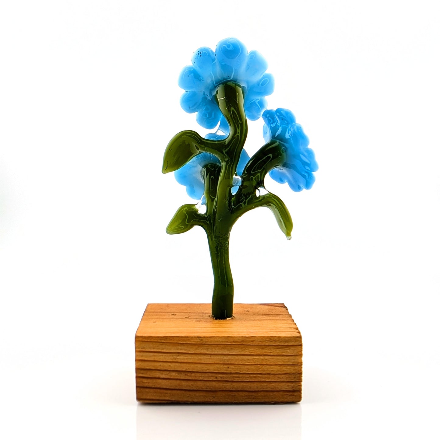 Ethan Windy
Blue Meanies, 2024
Glass Sculpture
Approx. 52 x 38 x 115 mm

Signed + Dated by the artist. From Ethan Windy's Giant Flowers Series