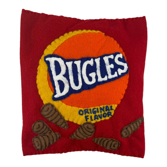Lucy Sparrow
Bugles, 2025
Felt and acrylic paint
Approx. 2 x 7 x 8 in

Handmade felt soft sculpture painted by Lucy Sparrow. Hand signed on verso.