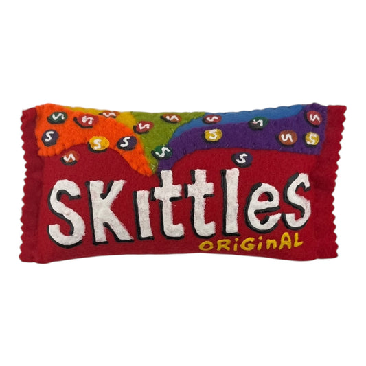 Lucy Sparrow
Skittles, 2025
Felt and acrylic paint
Approx. 2 x 3 x 6 in

Handmade felt soft sculpture painted by Lucy Sparrow. Hand signed on verso.