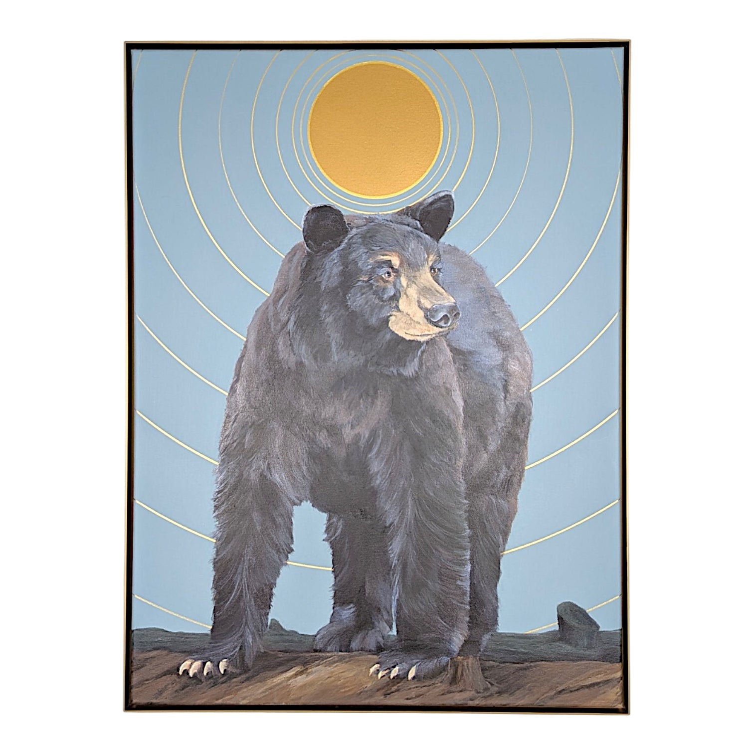 A framed art print depicting a large black bear standing on a rocky ground against a light blue sky with a large yellow sun and concentric yellow rings.