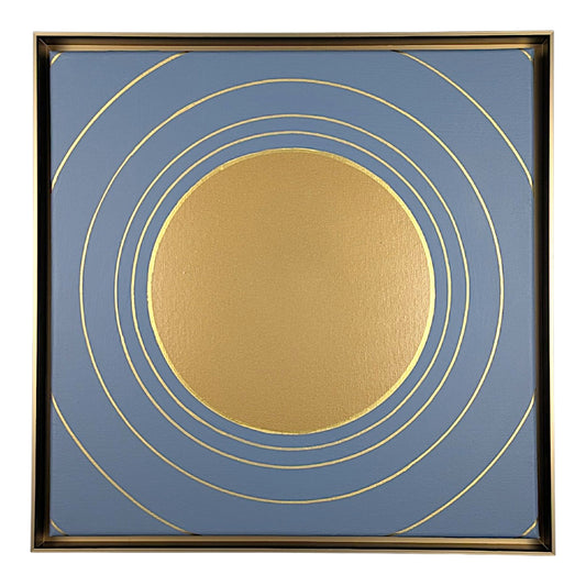 Square abstract wall art featuring a textured gold circle centered on a muted blue background, surrounded by thin gold concentric rings and enclosed in a thin gold frame.