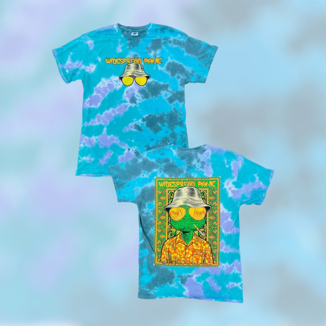 Todd Slater Widespread Panic Vegas 2026 "Fear & Loathing" Tie Dye Shirt 

- Printed on a Colortone T Shirt by Ruby Sue Graphics 
- 100% cotton 
- Pre-shrunk 
- Classic fit 
- Ribbed collar 
- Shoulder-to-shoulder taping 
- Double-needle sleeves and bottom hem 
- Sewn in label 

*Please note there may be slight variations in color and fit (up to 1–2 inches) due to the custom dye process. Wash separately and enjoy the uniqueness of your garment!
