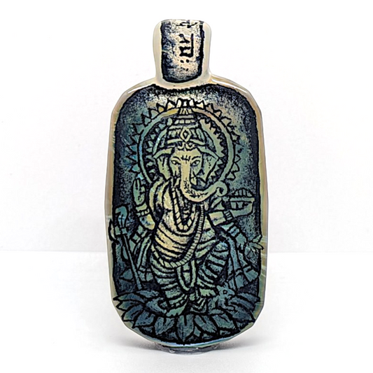 Trevy Metal x WJC
Ganesha Tablet, 2026
Borosilicate glass pendant
69 x 34 mm

*Please note this piece is featured in Trevy Metal’s solo show that will be on display until May 23rd, 2026. Artwork from the exhibition will be shipped early the following week. Thank you for your support & understanding :)