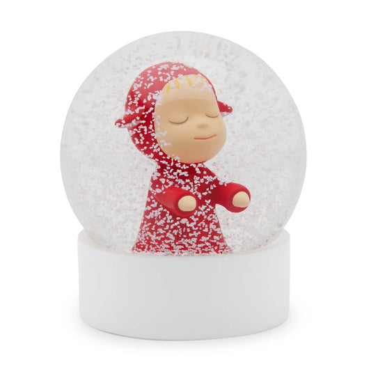 Yoshitomo Nara Little Wanderer (Red) Snow Globe 

Hand painted resin figure inside glass snow globe with round rubber-wood base 
Approx. 4.3 in tall | 3.9 in diameter 
Snow Globe features Little Wanderer—a  character based on the 1999 sculptures "Little Pilgrims (Night Walking)" by Yoshitomo Nara 

*Do not place the snow globe in direct sunlight 