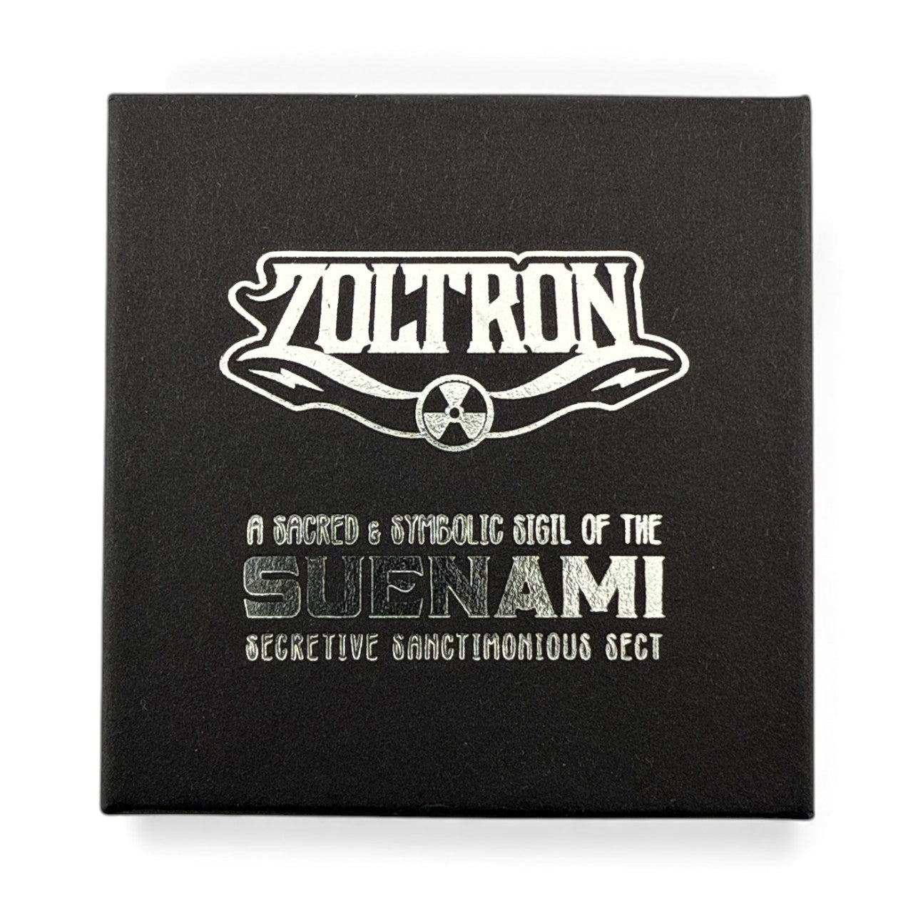 Zoltron 
Sue Nami Sigil Pin, 2025 
3D Die Struck Brass with Patina 
Approx. 2 in diameter | 3.5 mm thick 
Edition of 200 